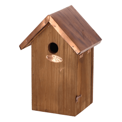Bruin vogelhuis met koperen dak