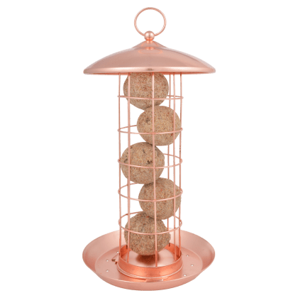 vetbolhouder met vetbollen in koperkleurige houder.